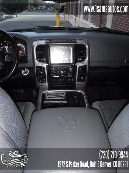 2016 Ram 1500 4WD Quad Cab 140.5" Big Horn, available for sale in Denver, Colorado | Sam's Automotive. Denver, Colorado 2016 Ram 1500 4WD Quad Cab 140.5" Big Horn, available for sale in Denver, Colorado | Sam's Automotive. Denver, Colorado