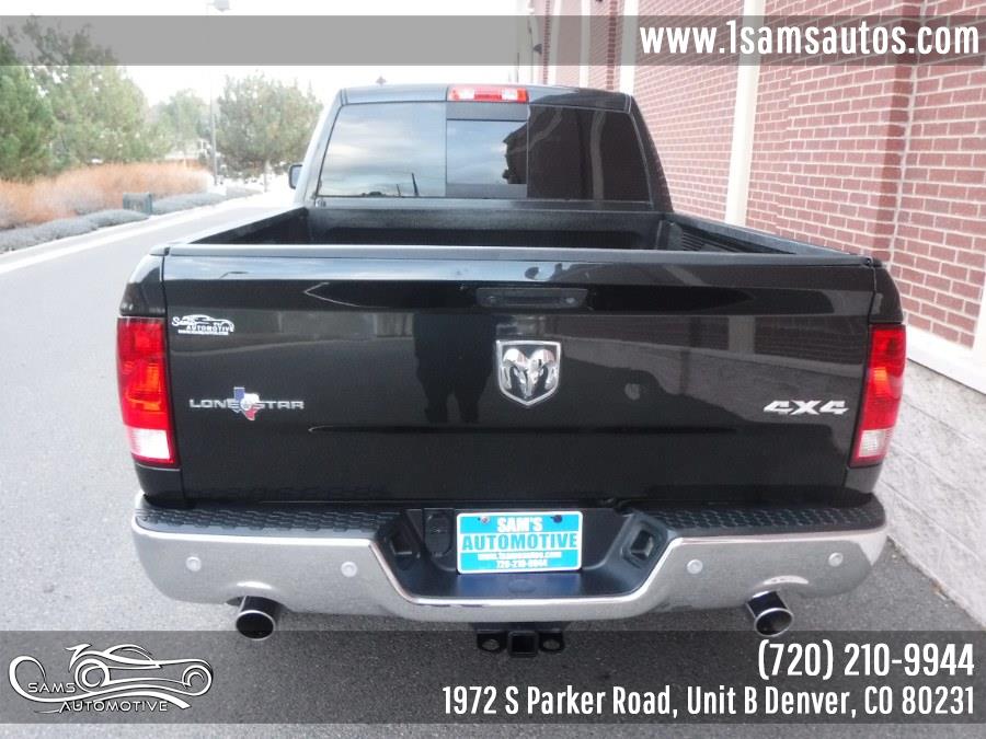 2016 Ram 1500 4WD Quad Cab 140.5" Big Horn, available for sale in Denver, Colorado | Sam's Automotive. Denver, Colorado 2016 Ram 1500 4WD Quad Cab 140.5" Big Horn, available for sale in Denver, Colorado | Sam's Automotive. Denver, Colorado