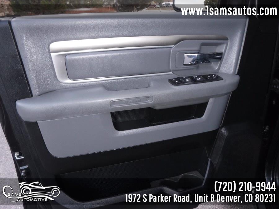 2016 Ram 1500 4WD Quad Cab 140.5" Big Horn, available for sale in Denver, Colorado | Sam's Automotive. Denver, Colorado 2016 Ram 1500 4WD Quad Cab 140.5" Big Horn, available for sale in Denver, Colorado | Sam's Automotive. Denver, Colorado