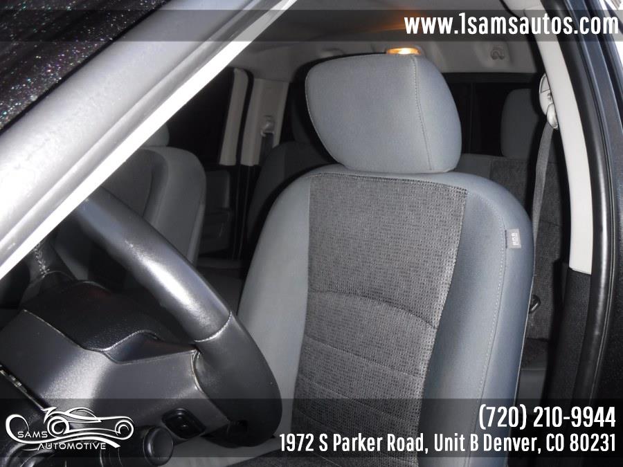 2016 Ram 1500 4WD Quad Cab 140.5" Big Horn, available for sale in Denver, Colorado | Sam's Automotive. Denver, Colorado 2016 Ram 1500 4WD Quad Cab 140.5" Big Horn, available for sale in Denver, Colorado | Sam's Automotive. Denver, Colorado