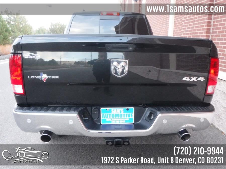 2016 Ram 1500 4WD Quad Cab 140.5" Big Horn, available for sale in Denver, Colorado | Sam's Automotive. Denver, Colorado 2016 Ram 1500 4WD Quad Cab 140.5" Big Horn, available for sale in Denver, Colorado | Sam's Automotive. Denver, Colorado