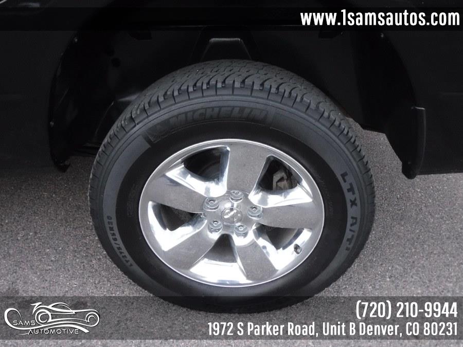 2016 Ram 1500 4WD Quad Cab 140.5" Big Horn, available for sale in Denver, Colorado | Sam's Automotive. Denver, Colorado 2016 Ram 1500 4WD Quad Cab 140.5" Big Horn, available for sale in Denver, Colorado | Sam's Automotive. Denver, Colorado