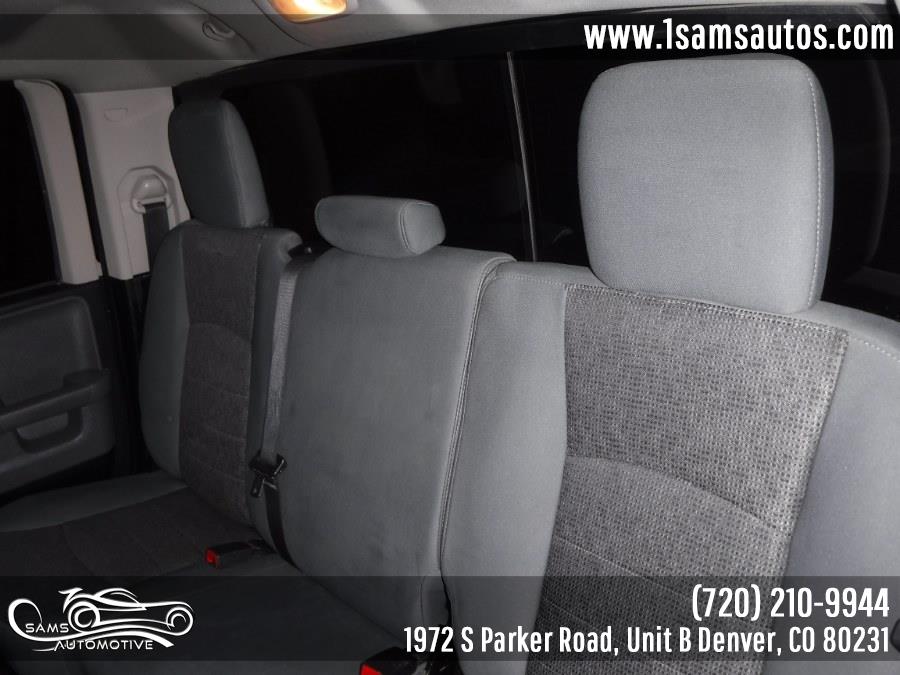 2016 Ram 1500 4WD Quad Cab 140.5" Big Horn, available for sale in Denver, Colorado | Sam's Automotive. Denver, Colorado 2016 Ram 1500 4WD Quad Cab 140.5" Big Horn, available for sale in Denver, Colorado | Sam's Automotive. Denver, Colorado