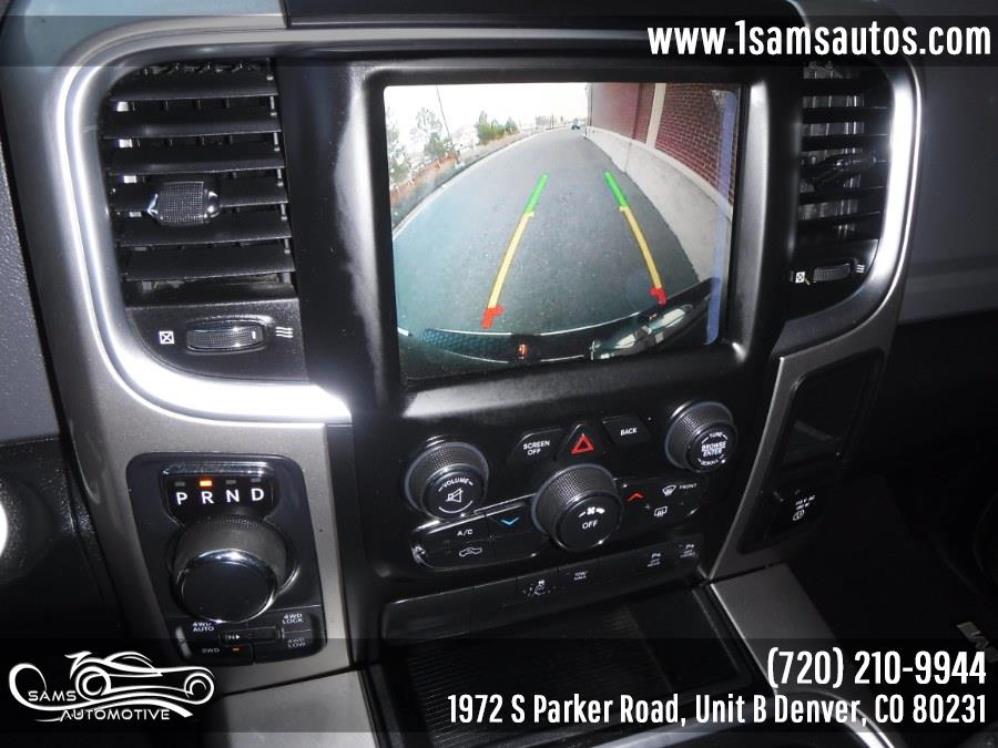 2016 Ram 1500 4WD Quad Cab 140.5" Big Horn, available for sale in Denver, Colorado | Sam's Automotive. Denver, Colorado 2016 Ram 1500 4WD Quad Cab 140.5" Big Horn, available for sale in Denver, Colorado | Sam's Automotive. Denver, Colorado