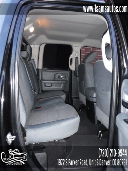 2016 Ram 1500 4WD Quad Cab 140.5" Big Horn, available for sale in Denver, Colorado | Sam's Automotive. Denver, Colorado 2016 Ram 1500 4WD Quad Cab 140.5" Big Horn, available for sale in Denver, Colorado | Sam's Automotive. Denver, Colorado