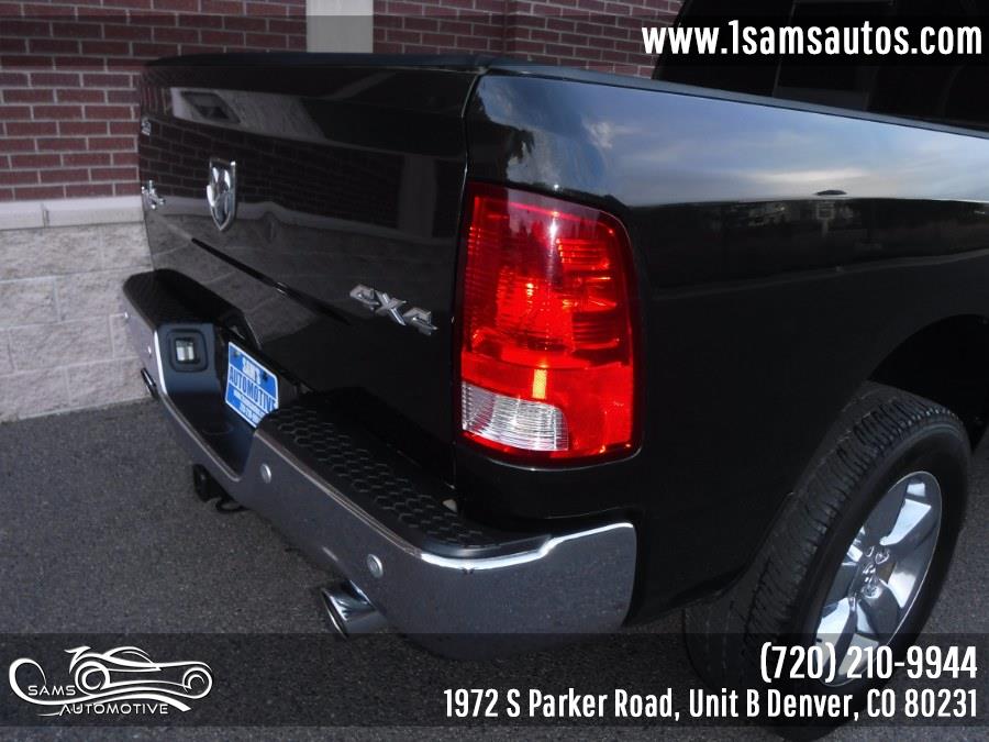 2016 Ram 1500 4WD Quad Cab 140.5" Big Horn, available for sale in Denver, Colorado | Sam's Automotive. Denver, Colorado 2016 Ram 1500 4WD Quad Cab 140.5" Big Horn, available for sale in Denver, Colorado | Sam's Automotive. Denver, Colorado