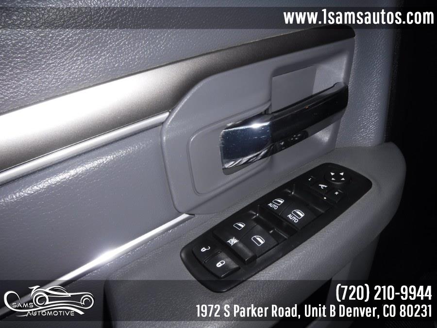 2016 Ram 1500 4WD Quad Cab 140.5" Big Horn, available for sale in Denver, Colorado | Sam's Automotive. Denver, Colorado 2016 Ram 1500 4WD Quad Cab 140.5" Big Horn, available for sale in Denver, Colorado | Sam's Automotive. Denver, Colorado