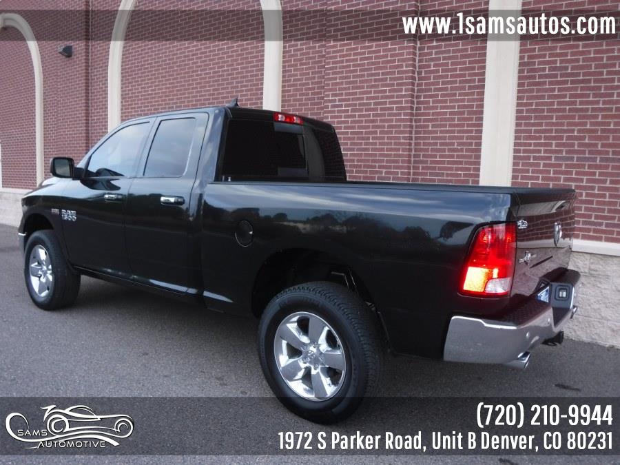 2016 Ram 1500 4WD Quad Cab 140.5" Big Horn, available for sale in Denver, Colorado | Sam's Automotive. Denver, Colorado 2016 Ram 1500 4WD Quad Cab 140.5" Big Horn, available for sale in Denver, Colorado | Sam's Automotive. Denver, Colorado