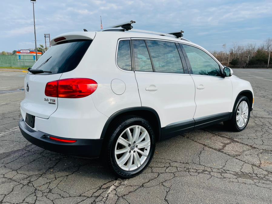 2013 Volkswagen Tiguan 4WD 4dr Auto SE, available for sale in New Britain, Connecticut | Supreme Automotive. New Britain, Connecticut 2013 Volkswagen Tiguan 4WD 4dr Auto SE, available for sale in New Britain, Connecticut | Supreme Automotive. New Britain, Connecticut