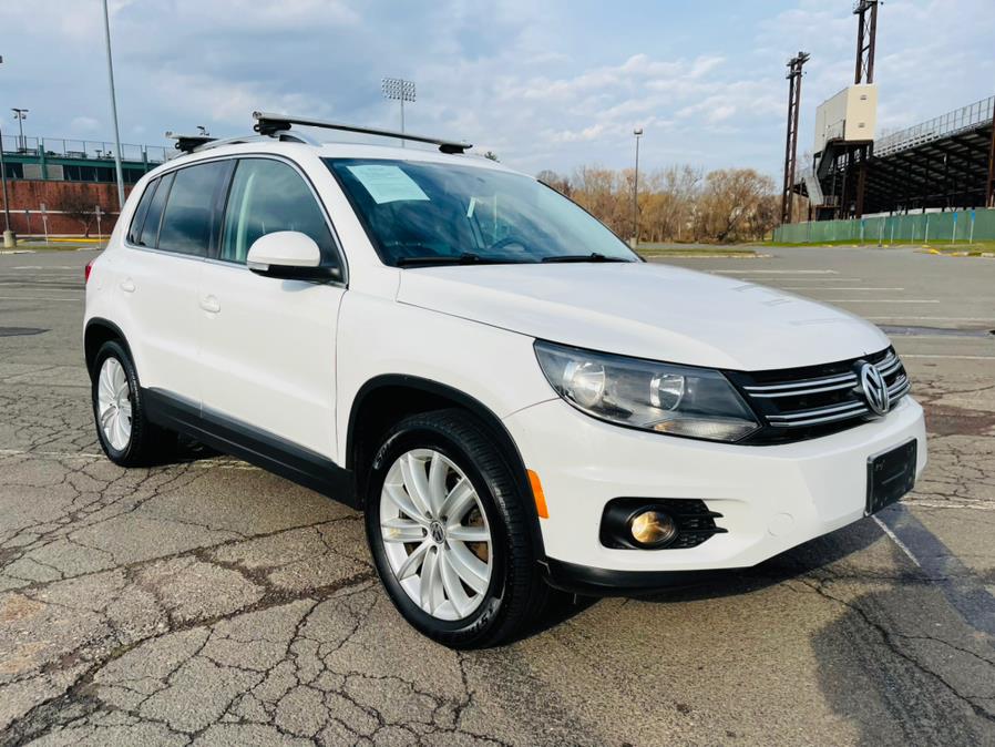 2013 Volkswagen Tiguan 4WD 4dr Auto SE, available for sale in New Britain, Connecticut | Supreme Automotive. New Britain, Connecticut 2013 Volkswagen Tiguan 4WD 4dr Auto SE, available for sale in New Britain, Connecticut | Supreme Automotive. New Britain, Connecticut