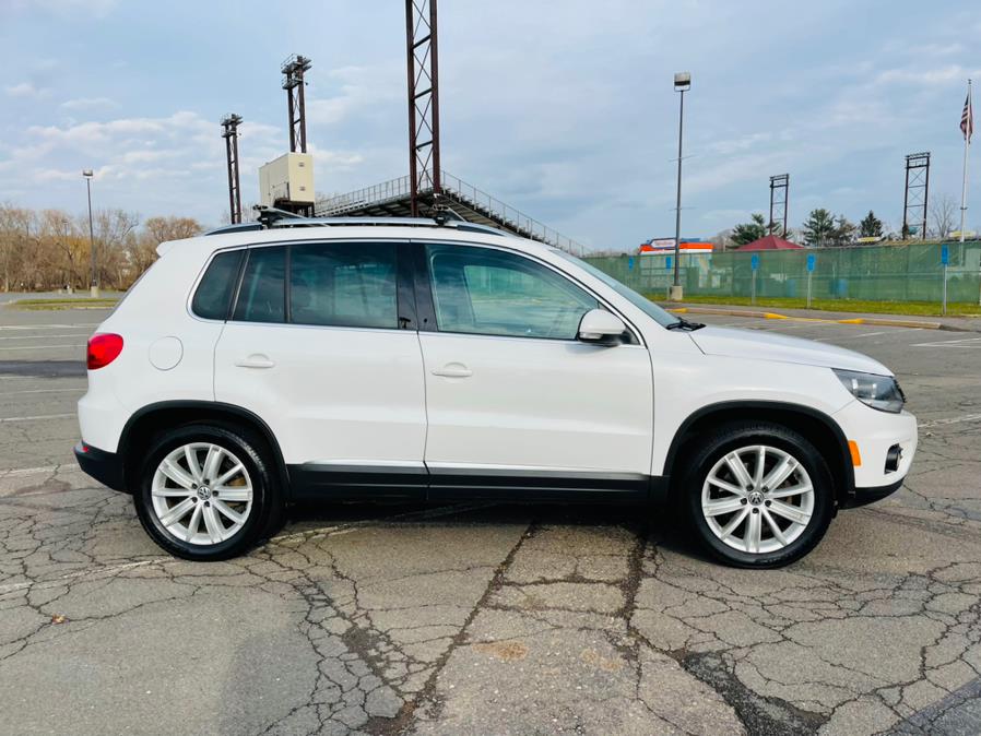 2013 Volkswagen Tiguan 4WD 4dr Auto SE, available for sale in New Britain, Connecticut | Supreme Automotive. New Britain, Connecticut 2013 Volkswagen Tiguan 4WD 4dr Auto SE, available for sale in New Britain, Connecticut | Supreme Automotive. New Britain, Connecticut