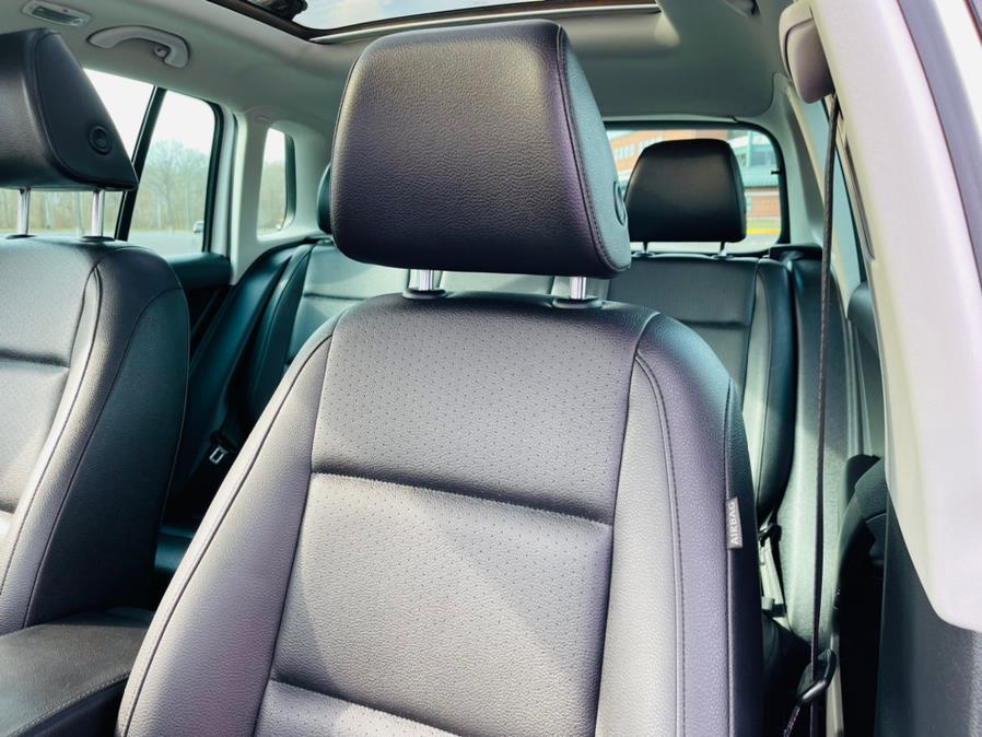 2013 Volkswagen Tiguan 4WD 4dr Auto SE, available for sale in New Britain, Connecticut | Supreme Automotive. New Britain, Connecticut 2013 Volkswagen Tiguan 4WD 4dr Auto SE, available for sale in New Britain, Connecticut | Supreme Automotive. New Britain, Connecticut