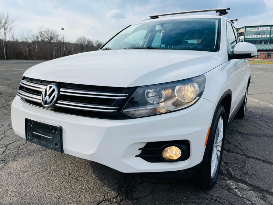 2013 Volkswagen Tiguan 4WD 4dr Auto SE, available for sale in New Britain, Connecticut | Supreme Automotive. New Britain, Connecticut 2013 Volkswagen Tiguan 4WD 4dr Auto SE, available for sale in New Britain, Connecticut | Supreme Automotive. New Britain, Connecticut
