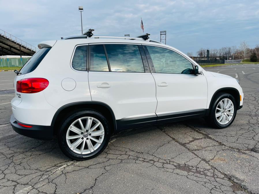 2013 Volkswagen Tiguan 4WD 4dr Auto SE, available for sale in New Britain, Connecticut | Supreme Automotive. New Britain, Connecticut 2013 Volkswagen Tiguan 4WD 4dr Auto SE, available for sale in New Britain, Connecticut | Supreme Automotive. New Britain, Connecticut