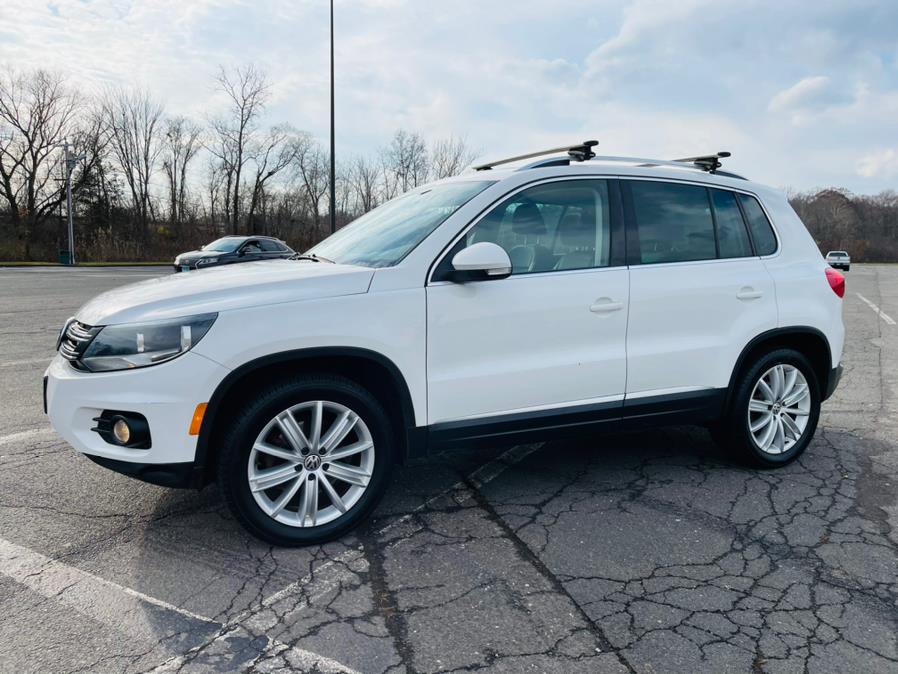 2013 Volkswagen Tiguan 4WD 4dr Auto SE, available for sale in New Britain, Connecticut | Supreme Automotive. New Britain, Connecticut 2013 Volkswagen Tiguan 4WD 4dr Auto SE, available for sale in New Britain, Connecticut | Supreme Automotive. New Britain, Connecticut