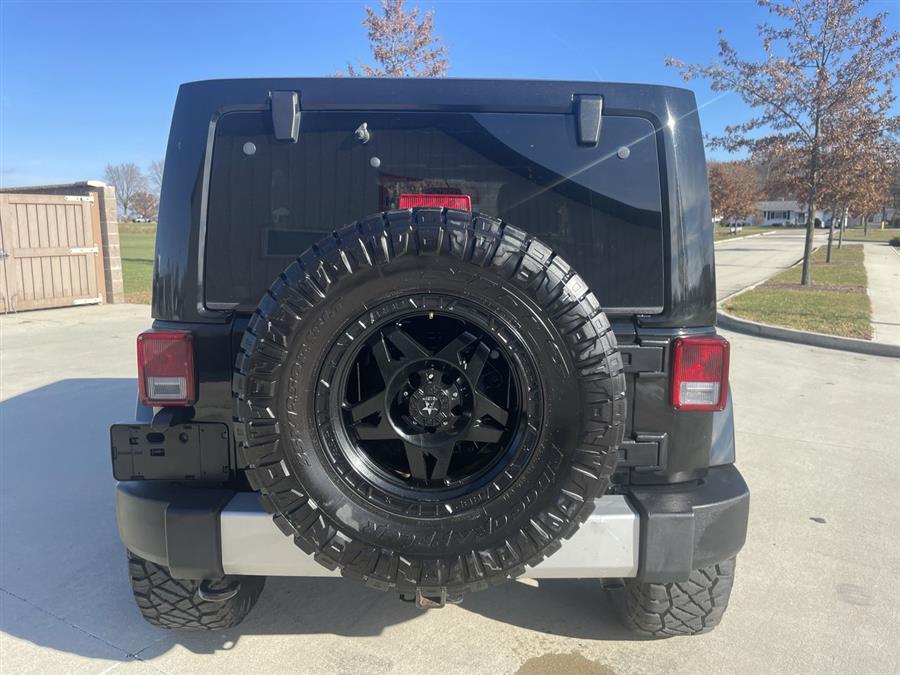 2014 Jeep Wrangler Unlimited 4WD 4dr Sahara, available for sale in Elida, Ohio | Josh's All Under Ten LLC. Elida, Ohio 2014 Jeep Wrangler Unlimited 4WD 4dr Sahara, available for sale in Elida, Ohio | Josh's All Under Ten LLC. Elida, Ohio