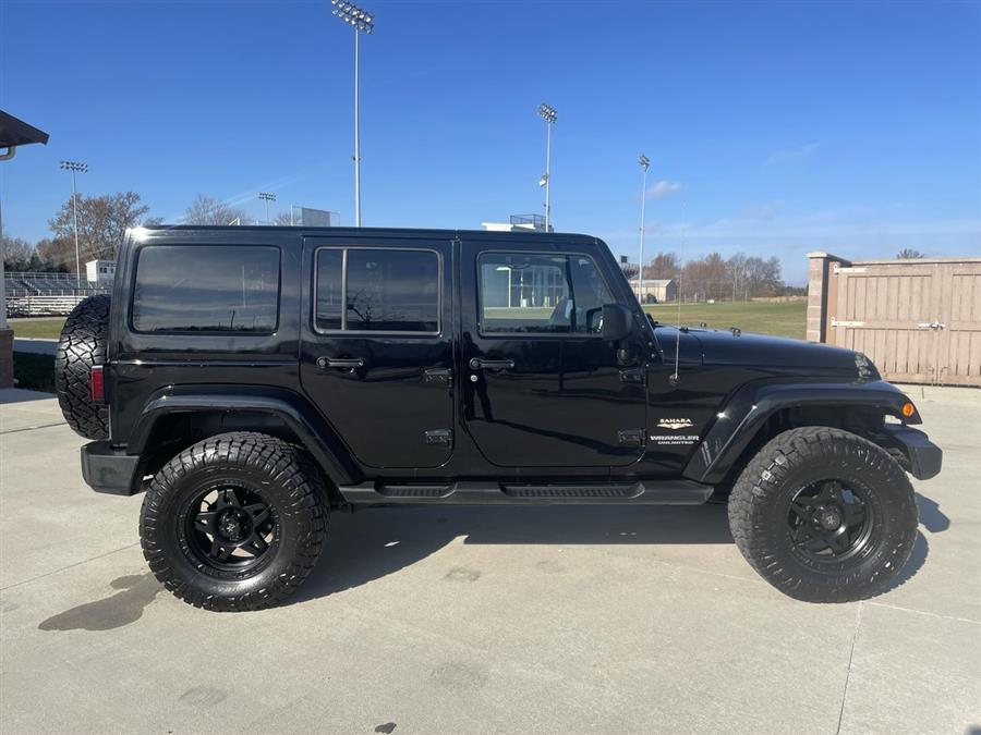 2014 Jeep Wrangler Unlimited 4WD 4dr Sahara, available for sale in Elida, Ohio | Josh's All Under Ten LLC. Elida, Ohio 2014 Jeep Wrangler Unlimited 4WD 4dr Sahara, available for sale in Elida, Ohio | Josh's All Under Ten LLC. Elida, Ohio