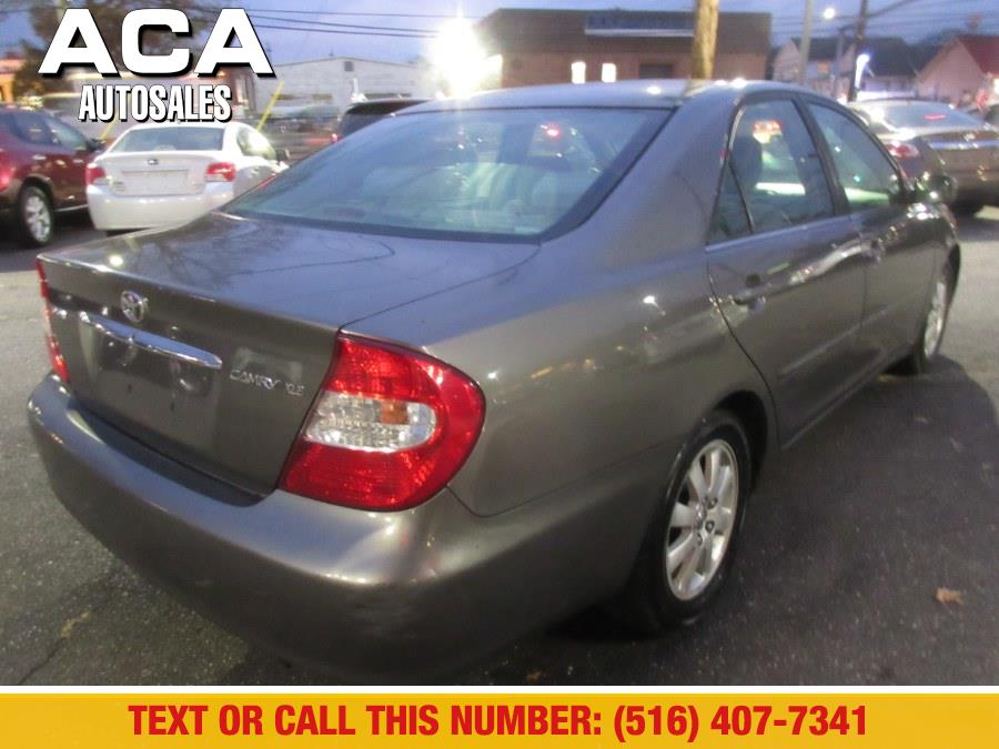 2003 Toyota Camry XLE, available for sale in Lynbrook, New York | ACA Auto Sales. Lynbrook, New York 2003 Toyota Camry XLE, available for sale in Lynbrook, New York | ACA Auto Sales. Lynbrook, New York