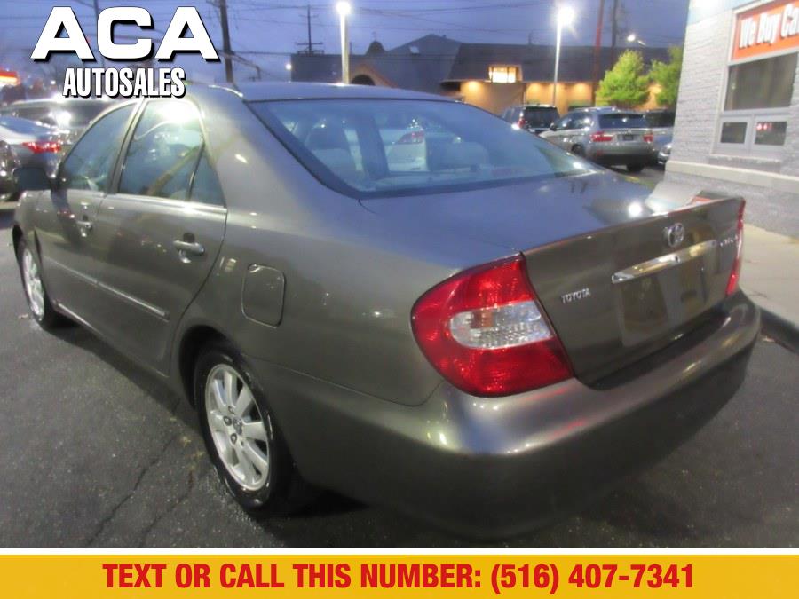 2003 Toyota Camry XLE, available for sale in Lynbrook, New York | ACA Auto Sales. Lynbrook, New York 2003 Toyota Camry XLE, available for sale in Lynbrook, New York | ACA Auto Sales. Lynbrook, New York