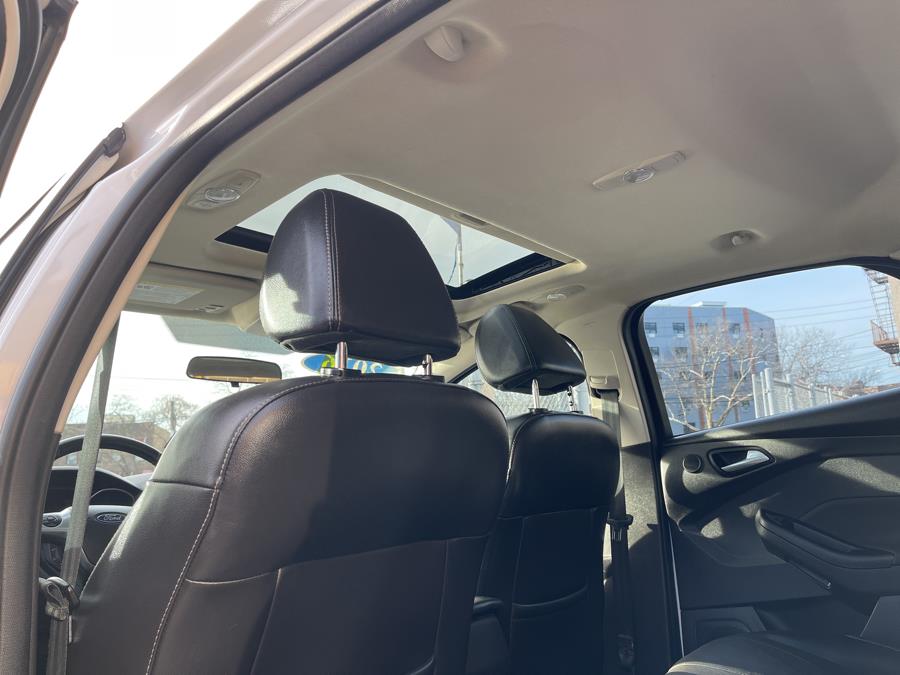 2014 Ford Focus 5dr HB Titanium, available for sale in Bronx, New York | New York Motors Group Solutions LLC. Bronx, New York 2014 Ford Focus 5dr HB Titanium, available for sale in Bronx, New York | New York Motors Group Solutions LLC. Bronx, New York