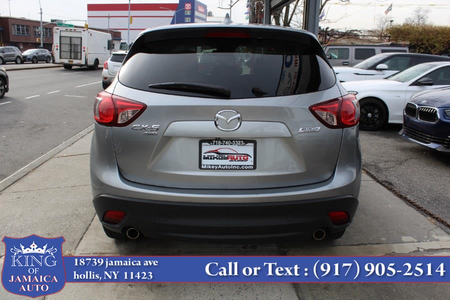 2014 Mazda CX-5 AWD 4dr Auto Touring, available for sale in Hollis, New York | King of Jamaica Auto Inc. Hollis, New York 2014 Mazda CX-5 AWD 4dr Auto Touring, available for sale in Hollis, New York | King of Jamaica Auto Inc. Hollis, New York