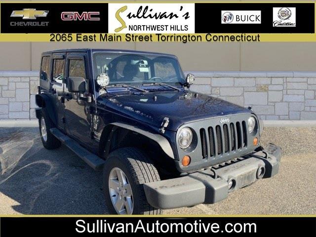 2013 Jeep Wrangler Unlimited Sport, available for sale in Avon, Connecticut | Sullivan Automotive Group. Avon, Connecticut