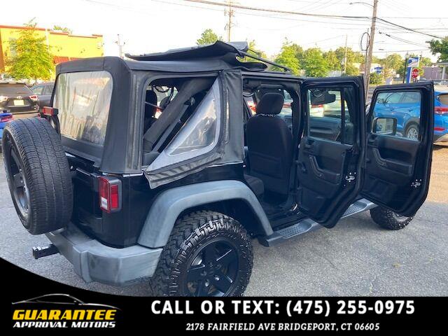 2014 Jeep Wrangler Unlimited Sport 4x4 4dr SUV, available for sale in Bridgeport, Connecticut | Guarantee Approval Motors. Bridgeport, Connecticut 2014 Jeep Wrangler Unlimited Sport 4x4 4dr SUV, available for sale in Bridgeport, Connecticut | Guarantee Approval Motors. Bridgeport, Connecticut