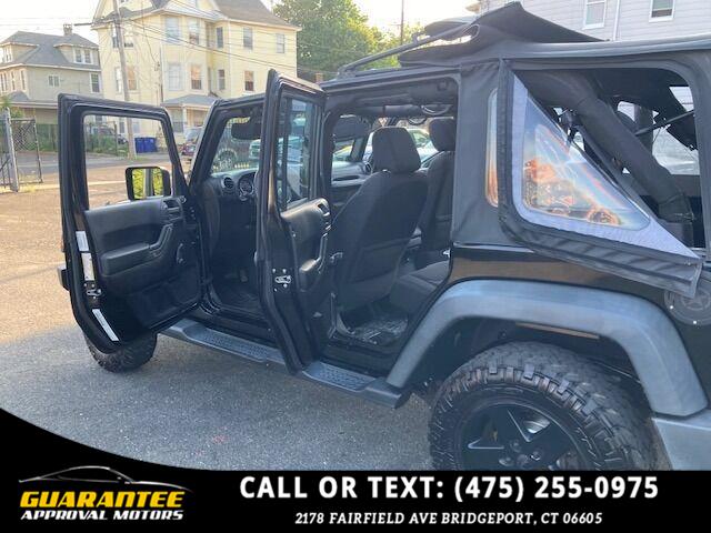 2014 Jeep Wrangler Unlimited Sport 4x4 4dr SUV, available for sale in Bridgeport, Connecticut | Guarantee Approval Motors. Bridgeport, Connecticut 2014 Jeep Wrangler Unlimited Sport 4x4 4dr SUV, available for sale in Bridgeport, Connecticut | Guarantee Approval Motors. Bridgeport, Connecticut