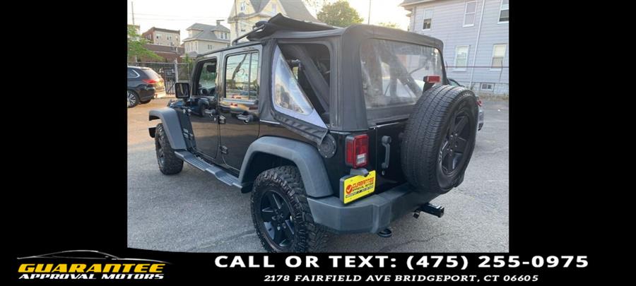 2014 Jeep Wrangler Unlimited Sport 4x4 4dr SUV, available for sale in Bridgeport, Connecticut | Guarantee Approval Motors. Bridgeport, Connecticut 2014 Jeep Wrangler Unlimited Sport 4x4 4dr SUV, available for sale in Bridgeport, Connecticut | Guarantee Approval Motors. Bridgeport, Connecticut