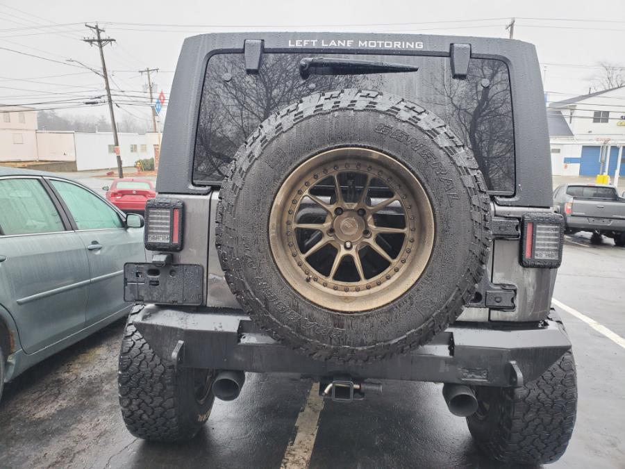 2014 Jeep Wrangler Unlimited 4WD 4dr Sahara, available for sale in Brockton, Massachusetts | Capital Lease and Finance. Brockton, Massachusetts