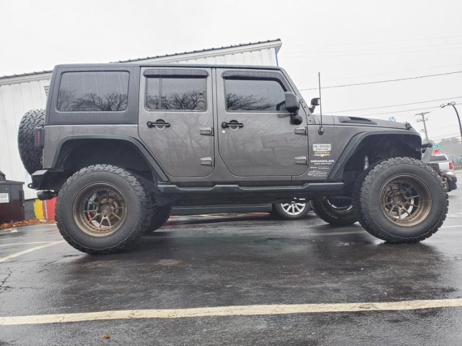 2014 Jeep Wrangler Unlimited 4WD 4dr Sahara, available for sale in Brockton, Massachusetts | Capital Lease and Finance. Brockton, Massachusetts