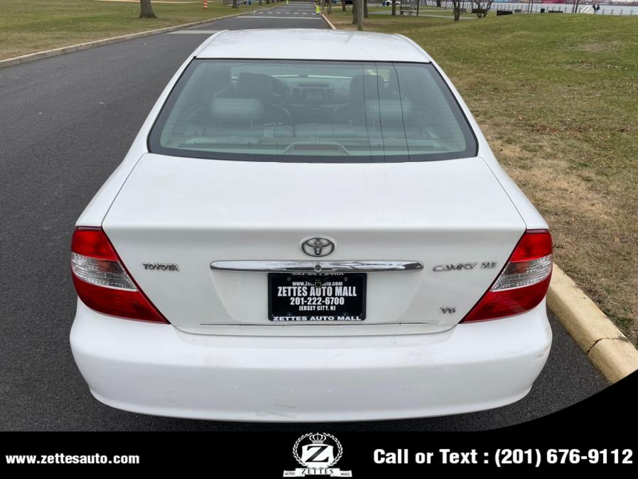 2002 Toyota Camry 4dr Sdn LE V6 Auto, available for sale in Jersey City, New Jersey | Zettes Auto Mall. Jersey City, New Jersey 2002 Toyota Camry 4dr Sdn LE V6 Auto, available for sale in Jersey City, New Jersey | Zettes Auto Mall. Jersey City, New Jersey