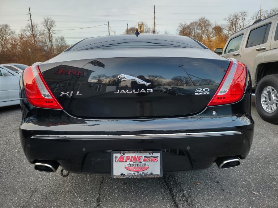 Used Jaguar XJ 4dr Sdn XJL Portfolio AWD 2014 | Alpine Motors Inc. Wantagh, New York Used Jaguar XJ 4dr Sdn XJL Portfolio AWD 2014 | Alpine Motors Inc. Wantagh, New York