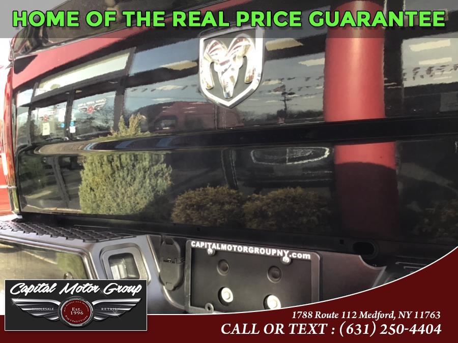 2015 Ram 1500 4WD Crew Cab 140.5" Sport, available for sale in Medford, New York | Capital Motor Group Inc. Medford, New York 2015 Ram 1500 4WD Crew Cab 140.5" Sport, available for sale in Medford, New York | Capital Motor Group Inc. Medford, New York