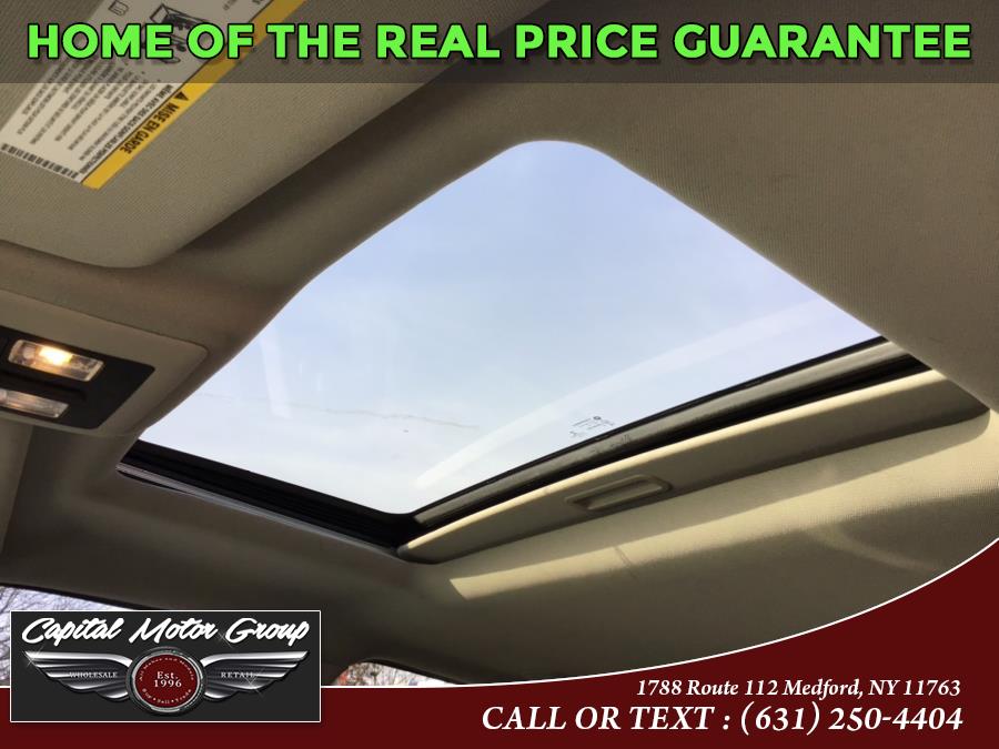 2015 Ram 1500 4WD Crew Cab 140.5" Sport, available for sale in Medford, New York | Capital Motor Group Inc. Medford, New York 2015 Ram 1500 4WD Crew Cab 140.5" Sport, available for sale in Medford, New York | Capital Motor Group Inc. Medford, New York