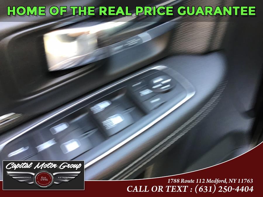 2015 Ram 1500 4WD Crew Cab 140.5" Sport, available for sale in Medford, New York | Capital Motor Group Inc. Medford, New York 2015 Ram 1500 4WD Crew Cab 140.5" Sport, available for sale in Medford, New York | Capital Motor Group Inc. Medford, New York