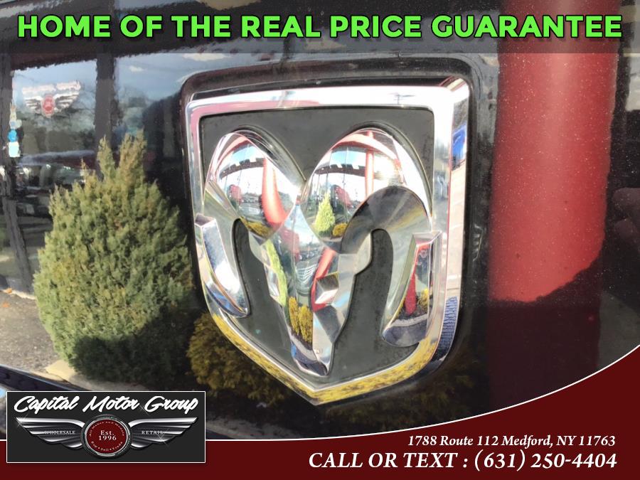 2015 Ram 1500 4WD Crew Cab 140.5" Sport, available for sale in Medford, New York | Capital Motor Group Inc. Medford, New York 2015 Ram 1500 4WD Crew Cab 140.5" Sport, available for sale in Medford, New York | Capital Motor Group Inc. Medford, New York