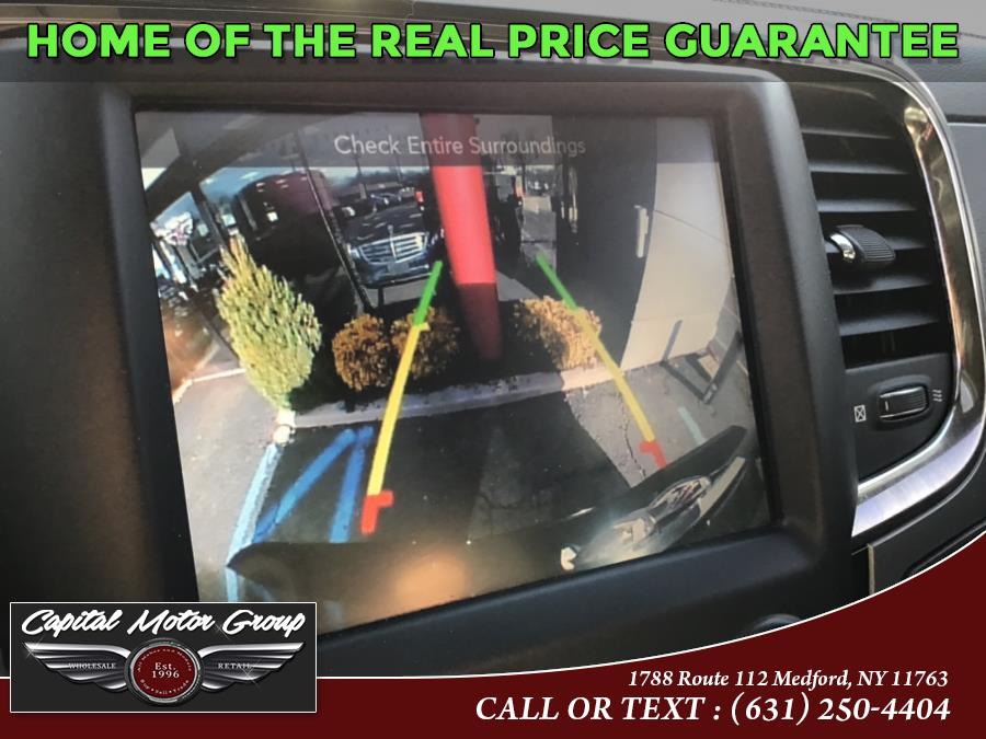 2015 Ram 1500 4WD Crew Cab 140.5" Sport, available for sale in Medford, New York | Capital Motor Group Inc. Medford, New York 2015 Ram 1500 4WD Crew Cab 140.5" Sport, available for sale in Medford, New York | Capital Motor Group Inc. Medford, New York