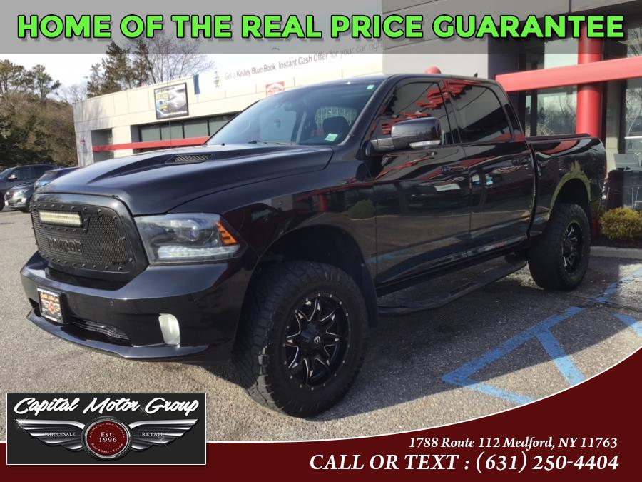 2015 Ram 1500 4WD Crew Cab 140.5" Sport, available for sale in Medford, New York | Capital Motor Group Inc. Medford, New York 2015 Ram 1500 4WD Crew Cab 140.5" Sport, available for sale in Medford, New York | Capital Motor Group Inc. Medford, New York