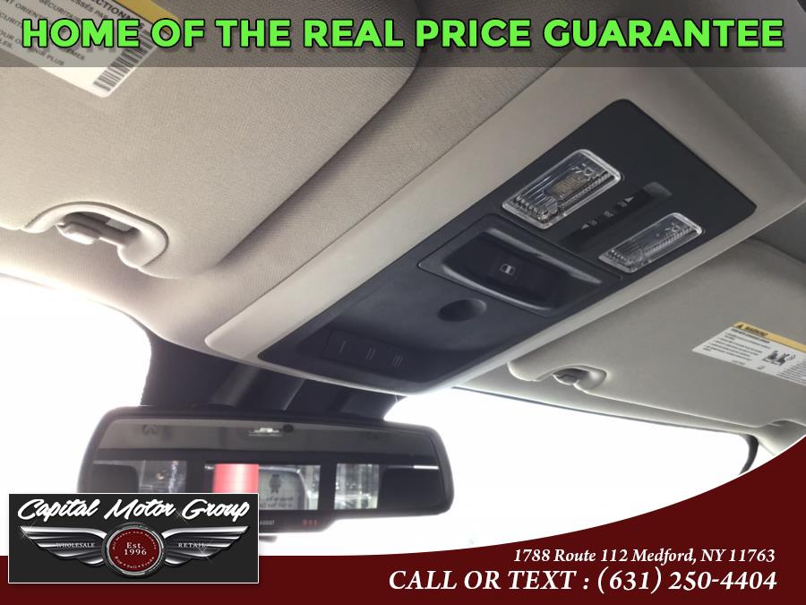 2015 Ram 1500 4WD Crew Cab 140.5" Sport, available for sale in Medford, New York | Capital Motor Group Inc. Medford, New York 2015 Ram 1500 4WD Crew Cab 140.5" Sport, available for sale in Medford, New York | Capital Motor Group Inc. Medford, New York