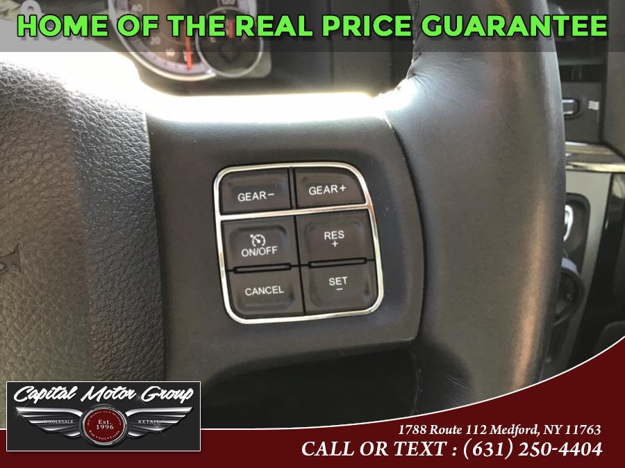 2015 Ram 1500 4WD Crew Cab 140.5" Sport, available for sale in Medford, New York | Capital Motor Group Inc. Medford, New York 2015 Ram 1500 4WD Crew Cab 140.5" Sport, available for sale in Medford, New York | Capital Motor Group Inc. Medford, New York