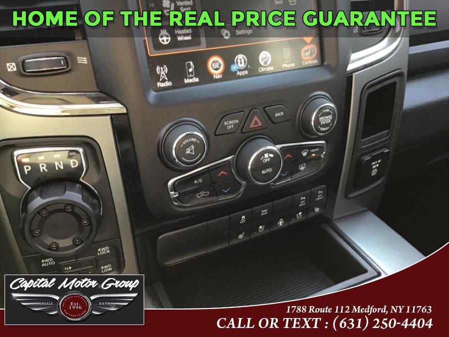 2015 Ram 1500 4WD Crew Cab 140.5" Sport, available for sale in Medford, New York | Capital Motor Group Inc. Medford, New York 2015 Ram 1500 4WD Crew Cab 140.5" Sport, available for sale in Medford, New York | Capital Motor Group Inc. Medford, New York