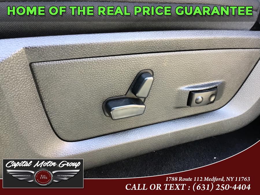 2015 Ram 1500 4WD Crew Cab 140.5" Sport, available for sale in Medford, New York | Capital Motor Group Inc. Medford, New York 2015 Ram 1500 4WD Crew Cab 140.5" Sport, available for sale in Medford, New York | Capital Motor Group Inc. Medford, New York