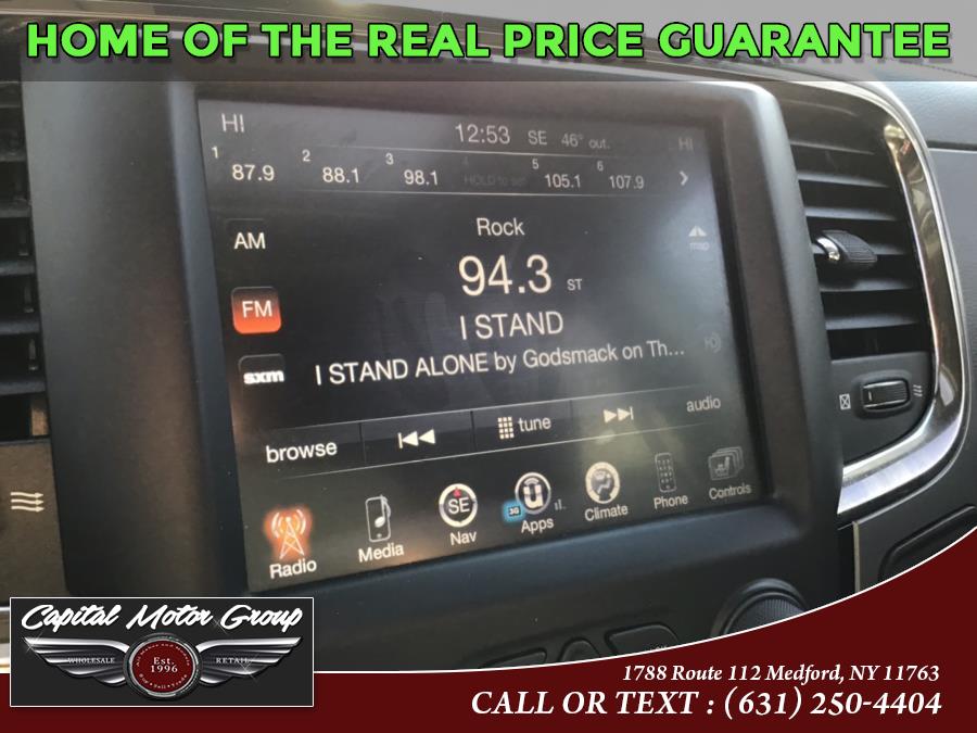 2015 Ram 1500 4WD Crew Cab 140.5" Sport, available for sale in Medford, New York | Capital Motor Group Inc. Medford, New York 2015 Ram 1500 4WD Crew Cab 140.5" Sport, available for sale in Medford, New York | Capital Motor Group Inc. Medford, New York