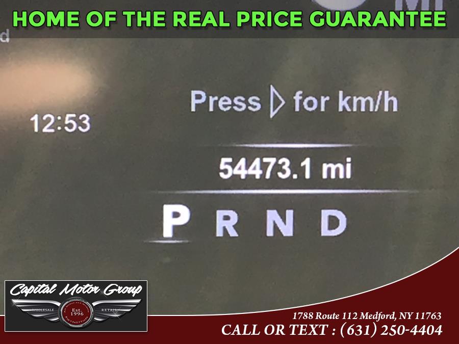 2015 Ram 1500 4WD Crew Cab 140.5" Sport, available for sale in Medford, New York | Capital Motor Group Inc. Medford, New York 2015 Ram 1500 4WD Crew Cab 140.5" Sport, available for sale in Medford, New York | Capital Motor Group Inc. Medford, New York