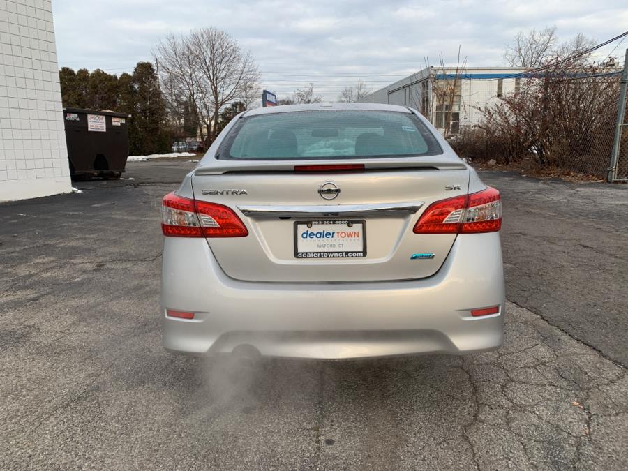 Used Nissan Sentra 4dr Sdn I4 CVT SR 2014 | Dealertown Auto Wholesalers. Milford, Connecticut Used Nissan Sentra 4dr Sdn I4 CVT SR 2014 | Dealertown Auto Wholesalers. Milford, Connecticut