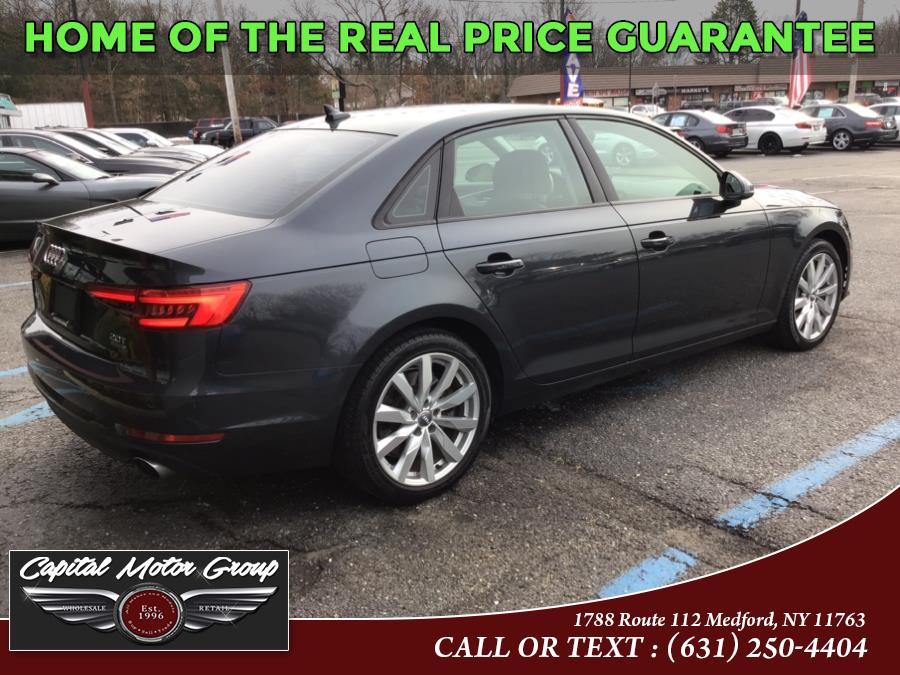 Used Audi A4 2.0 TFSI Premium quattro all-wheel drive 2017 | Capital Motor Group Inc. Medford, New York Used Audi A4 2.0 TFSI Premium quattro all-wheel drive 2017 | Capital Motor Group Inc. Medford, New York