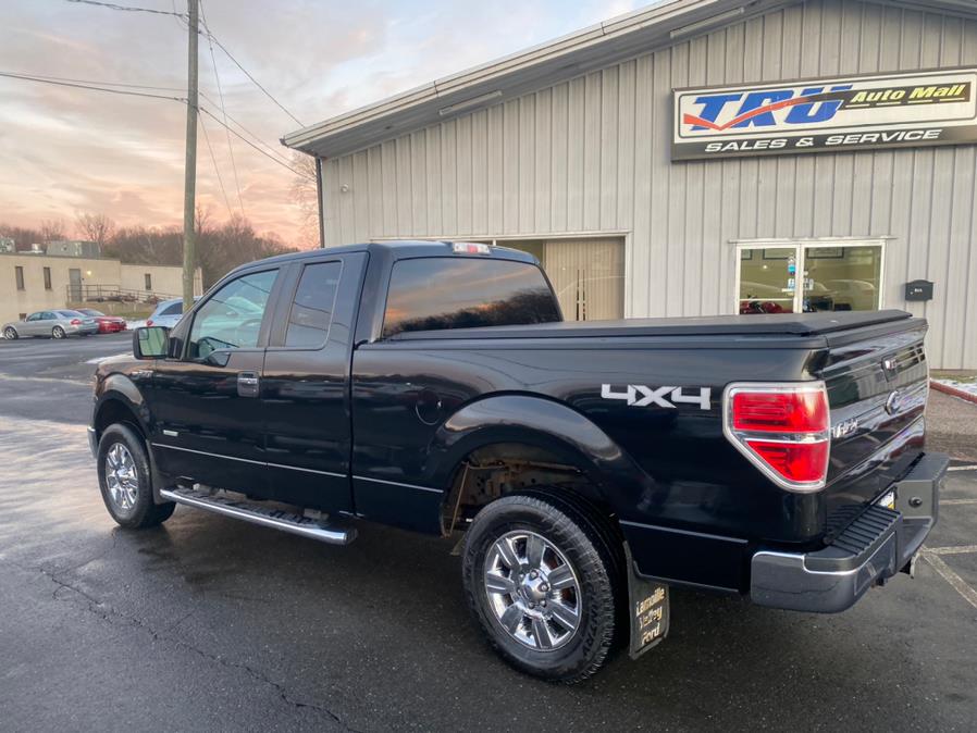 2012 Ford F-150 4WD SuperCab 145" XLT, available for sale in Berlin, Connecticut | Tru Auto Mall. Berlin, Connecticut 2012 Ford F-150 4WD SuperCab 145" XLT, available for sale in Berlin, Connecticut | Tru Auto Mall. Berlin, Connecticut
