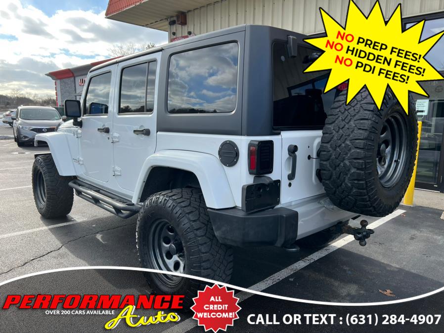 2013 Jeep Wrangler Unlimited 4WD 4dr Sahara, available for sale in Bohemia, New York | Performance Auto Inc. Bohemia, New York 2013 Jeep Wrangler Unlimited 4WD 4dr Sahara, available for sale in Bohemia, New York | Performance Auto Inc. Bohemia, New York