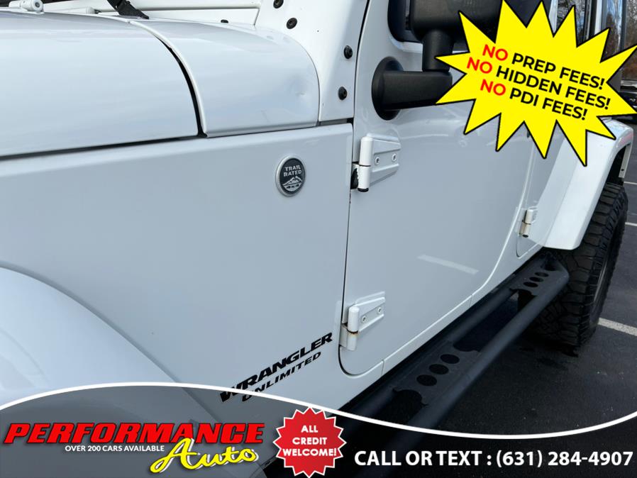 2013 Jeep Wrangler Unlimited 4WD 4dr Sahara, available for sale in Bohemia, New York | Performance Auto Inc. Bohemia, New York 2013 Jeep Wrangler Unlimited 4WD 4dr Sahara, available for sale in Bohemia, New York | Performance Auto Inc. Bohemia, New York